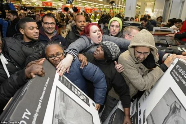 People fighting over products in black friday fashion